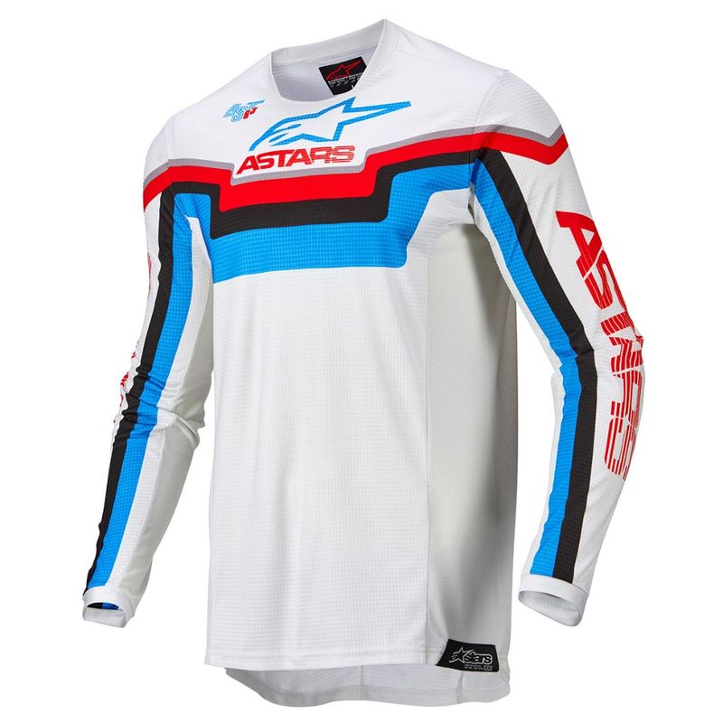 Alpinestars Crosströja Techstar Quadro i vitt med röda, blå och svarta detaljer. Perfekt för motocross och offroad-körning.