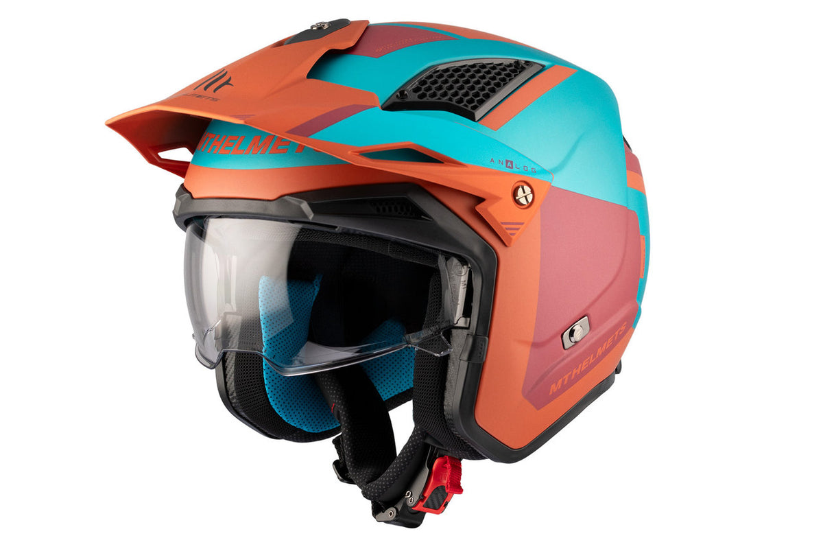 MT Helmets Öppen Mc-Hjälm District SV S D24 i orange och turkos med ECE 22.06 säkerhetscertifiering, solskydd och bluetooth-förberedelse.